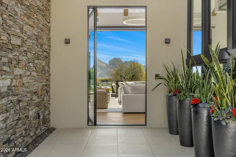 a kitchen with a stove a sink and a refrigerator