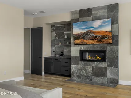 a utility room with cabinets dryer and washer