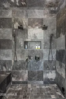 a front view of a house with a yard table and chairs