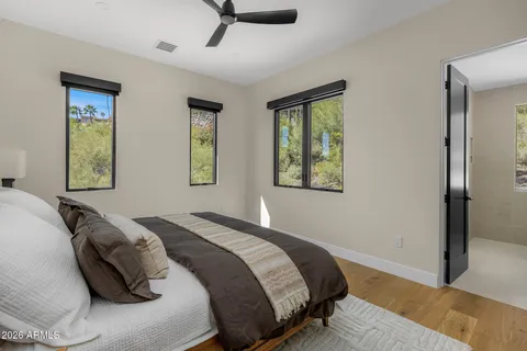 a kitchen with kitchen island a sink table and chairs