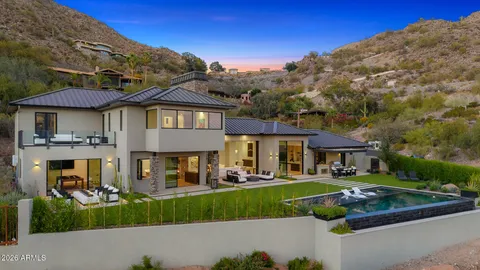 a view of a pathway both side of house