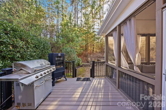 a view of a chairs and table in the balcony
