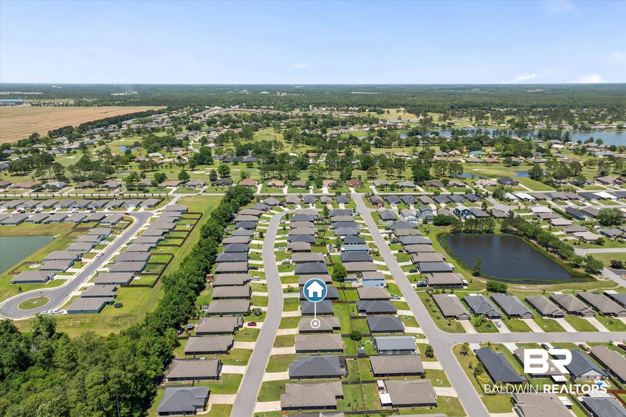 22420 Respite Lane Foley, AL 36535 - Photo 33 of 35 Aerial perspective highlighting a residential development with numerous single-story homes