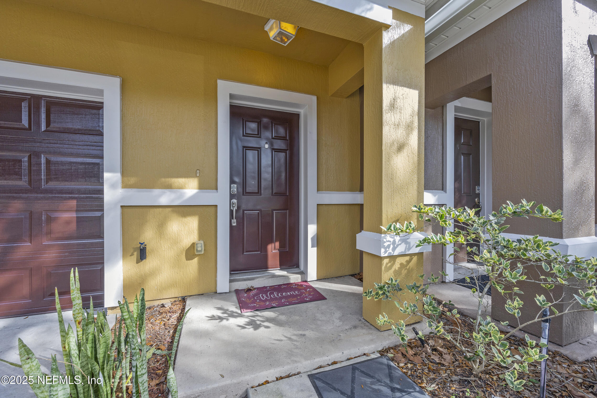 13309 Solar Drive Jacksonville, FL 32258 - Photo 2 of 29 a front view of a house with yard