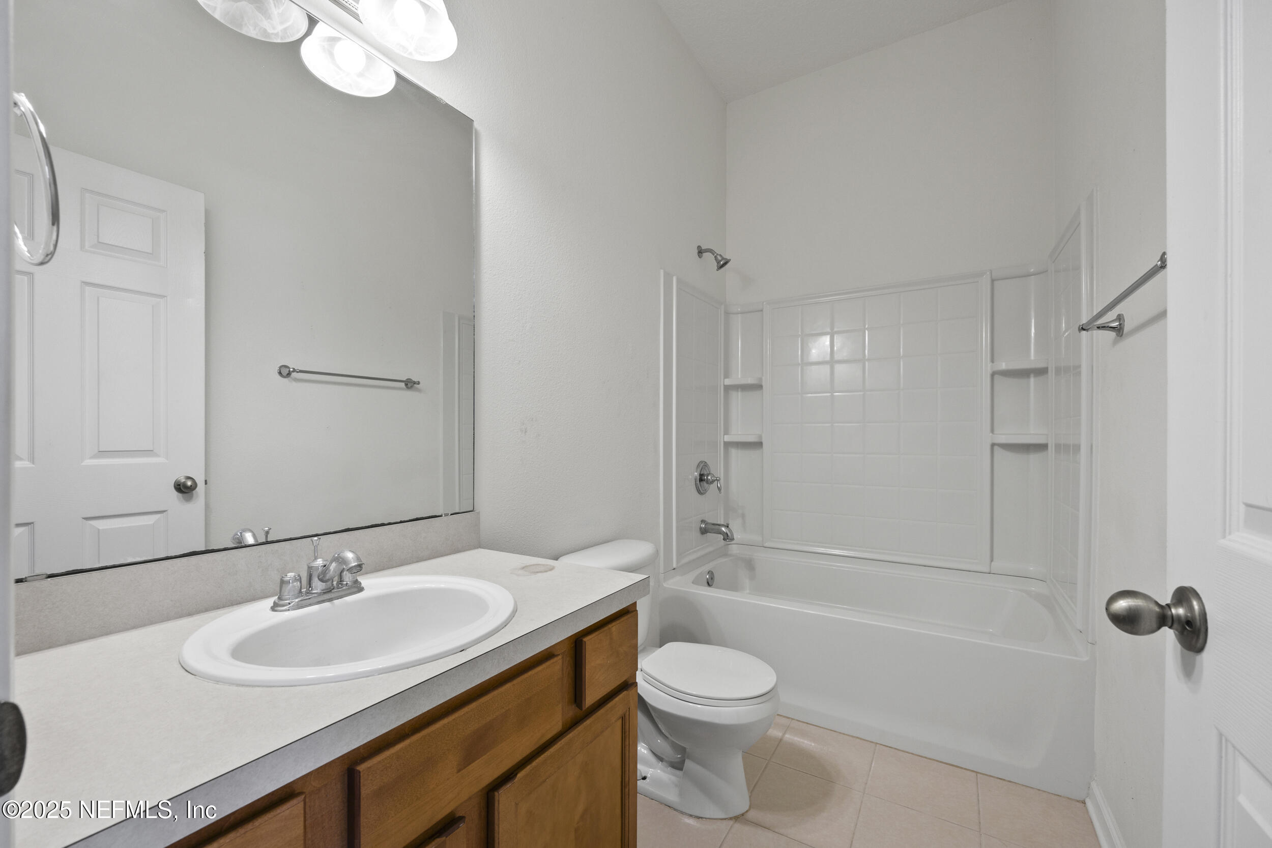 13309 Solar Drive Jacksonville, FL 32258 - Photo 21 of 29 a bathroom with a granite countertop sink toilet mirror and shower