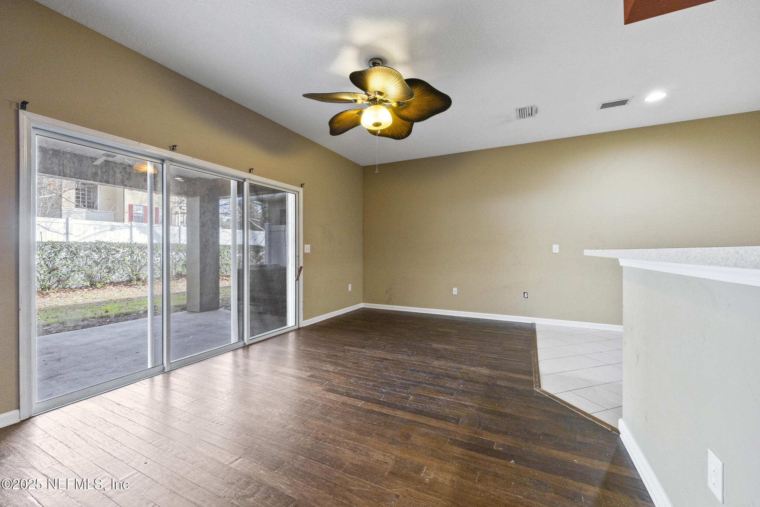 13309 Solar Drive Jacksonville, FL 32258 - Photo 7 of 29 a view of an entryway and wooden floor
