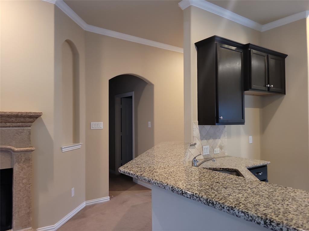 11821 Beach Street Frisco, TX 75036 - Photo 15 of 38 a bathroom with a granite countertop sink and a mirror