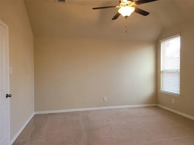 a view of livingroom with furniture and front door