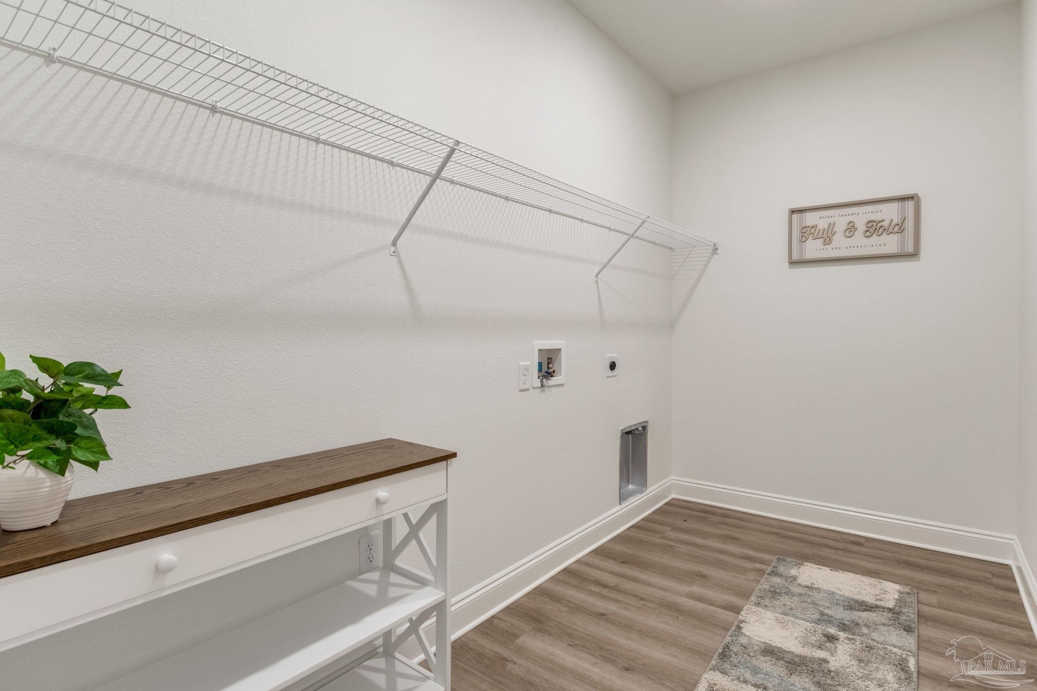 4404 Russell Elliott Road Jay, FL 32565 - Photo 47 of 62 a view of small space with wooden floor