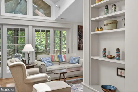 a kitchen with stainless steel appliances kitchen island granite countertop a stove a sink and a refrigerator