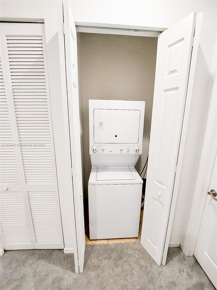4282 Northeast 9th Street, Unit 4282 Homestead, FL 33033 - Photo 16 of 28 a utility room with dryer and washer