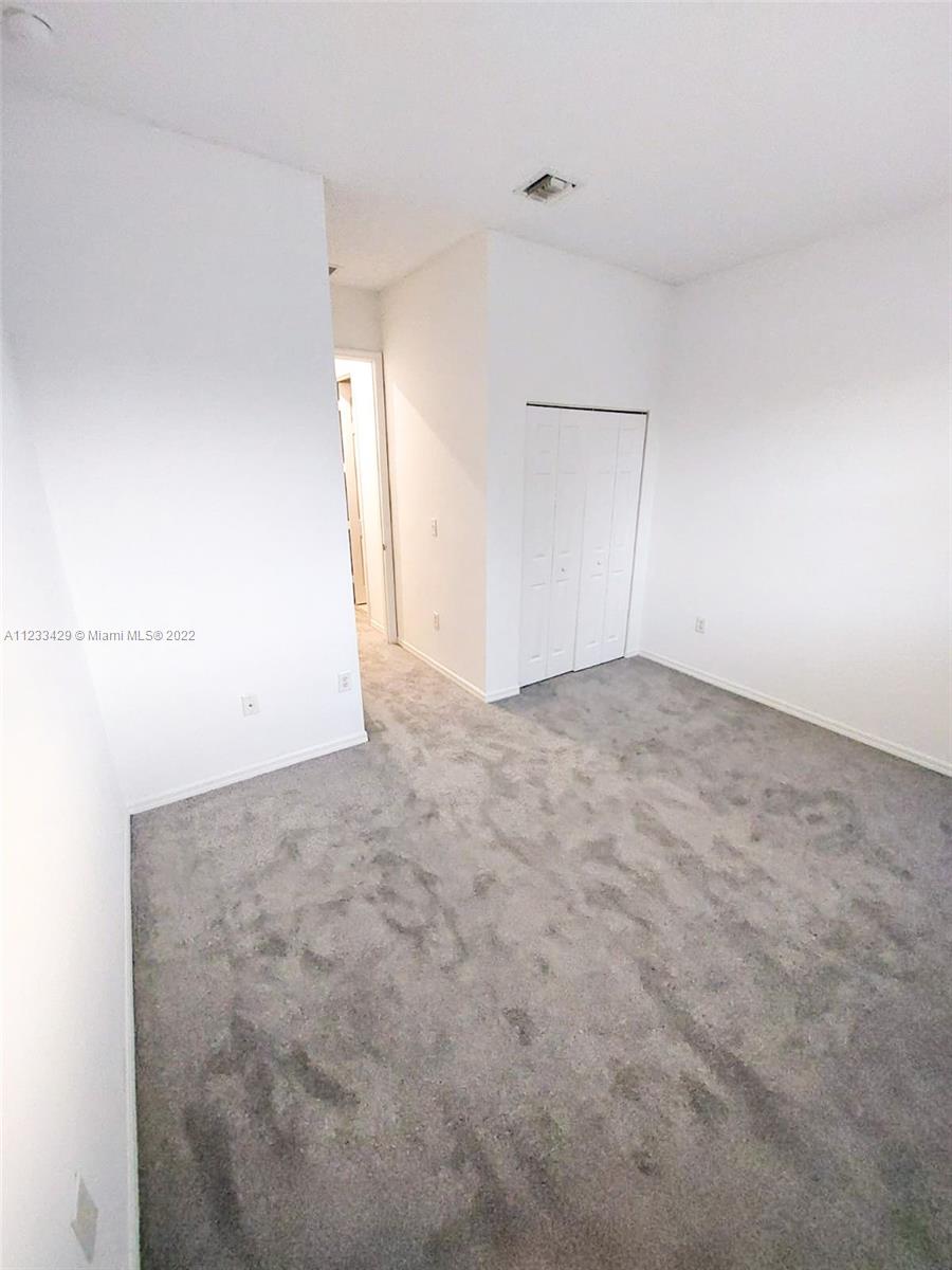 4282 Northeast 9th Street, Unit 4282 Homestead, FL 33033 - Photo 20 of 28 a view of an empty room
