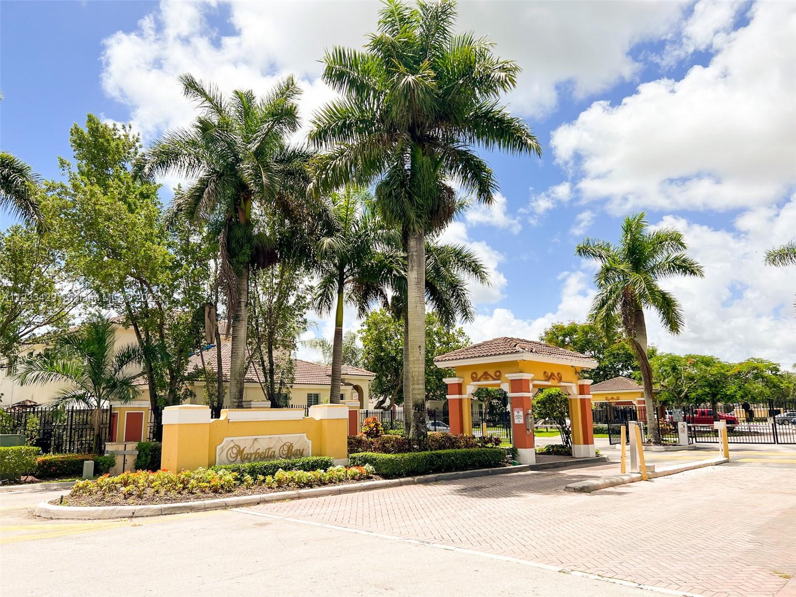 4282 Northeast 9th Street, Unit 4282 Homestead, FL 33033 - Photo 3 of 28 a view of road with building and trees