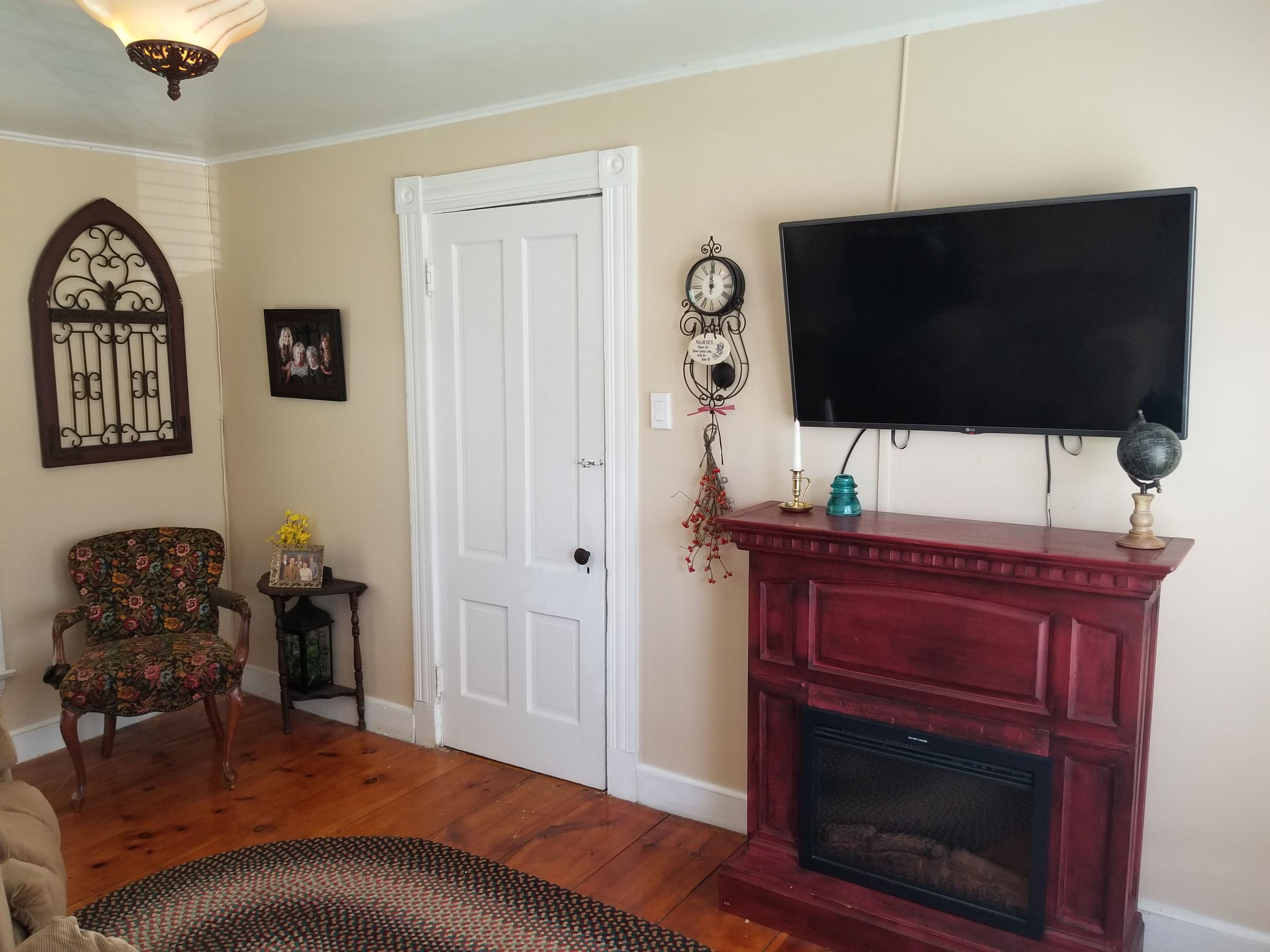 343 Paris Road Hebron, ME 04238 - Photo 23 of 50 Master suite den with electric fireplace