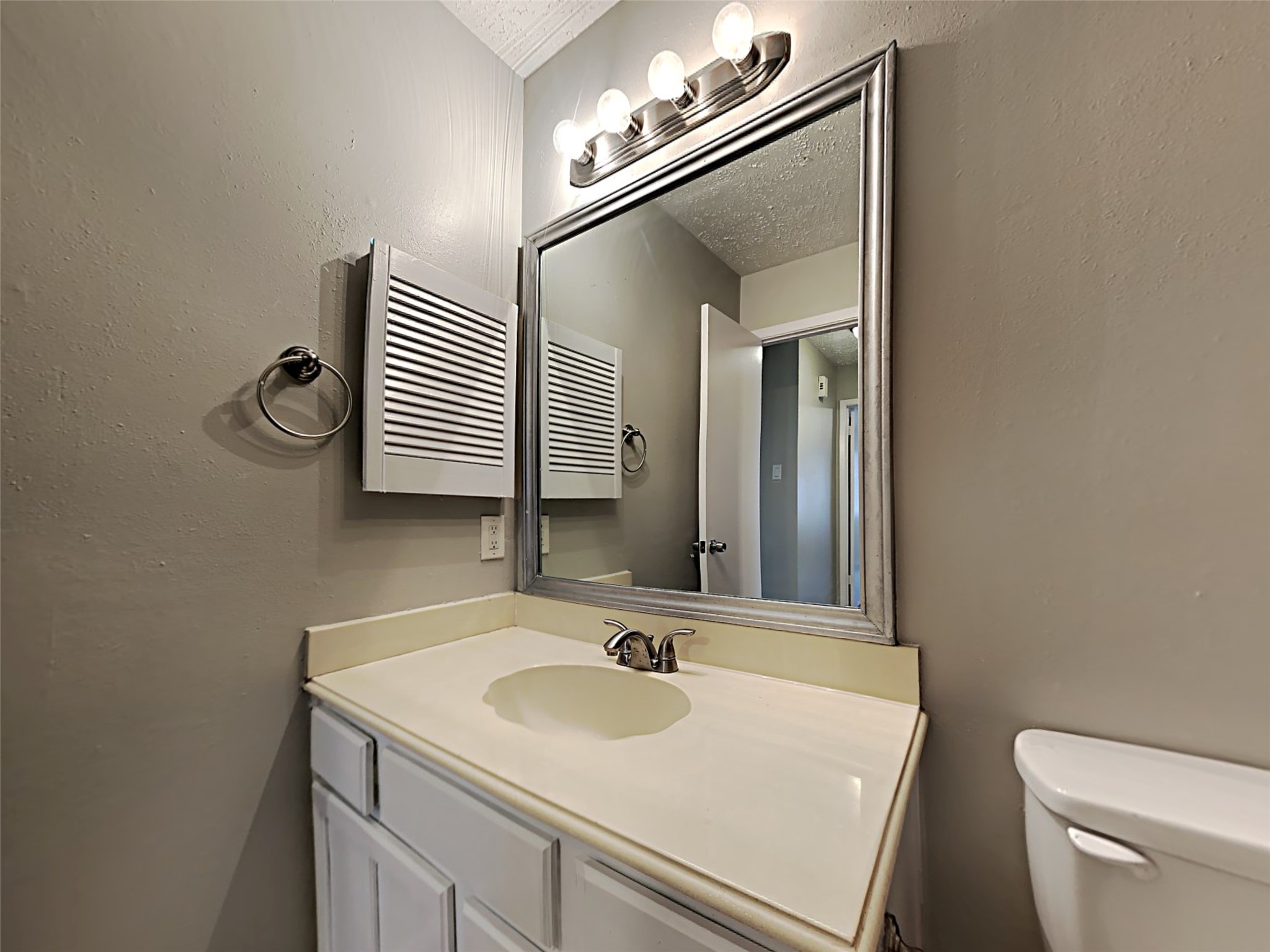 7306 Ridgeberry Drive Houston, TX 77095 - Photo 15 of 16 a bathroom with a sink and a toilet