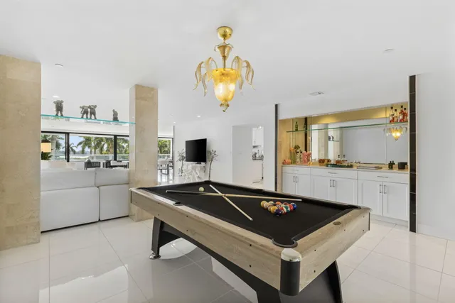 a kitchen that has a sink and a stove