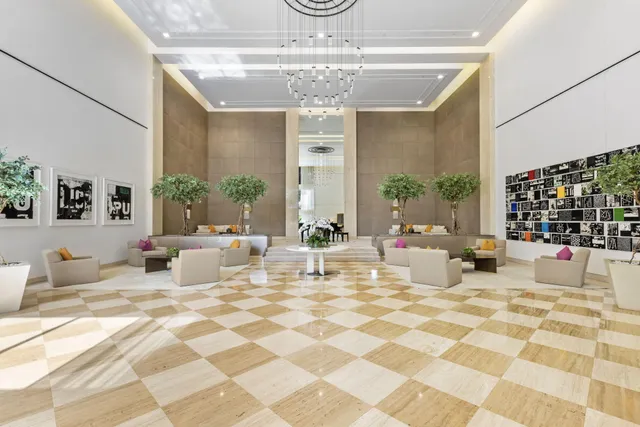 a swimming pool with outdoor seating