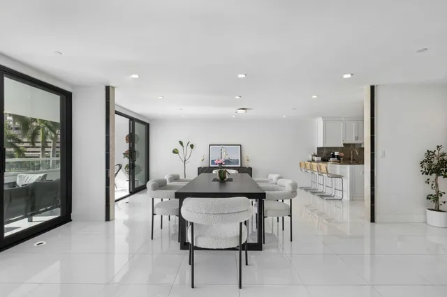 a kitchen with a table and chairs in it