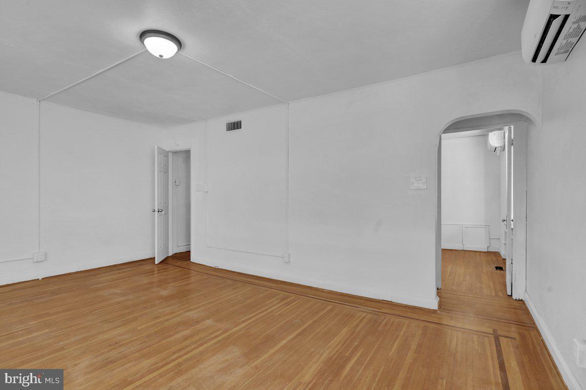 4000 Penn Sinking Spring Sinking Spring, PA 19608 - Photo 11 of 20 an empty room with wooden floor and mirror