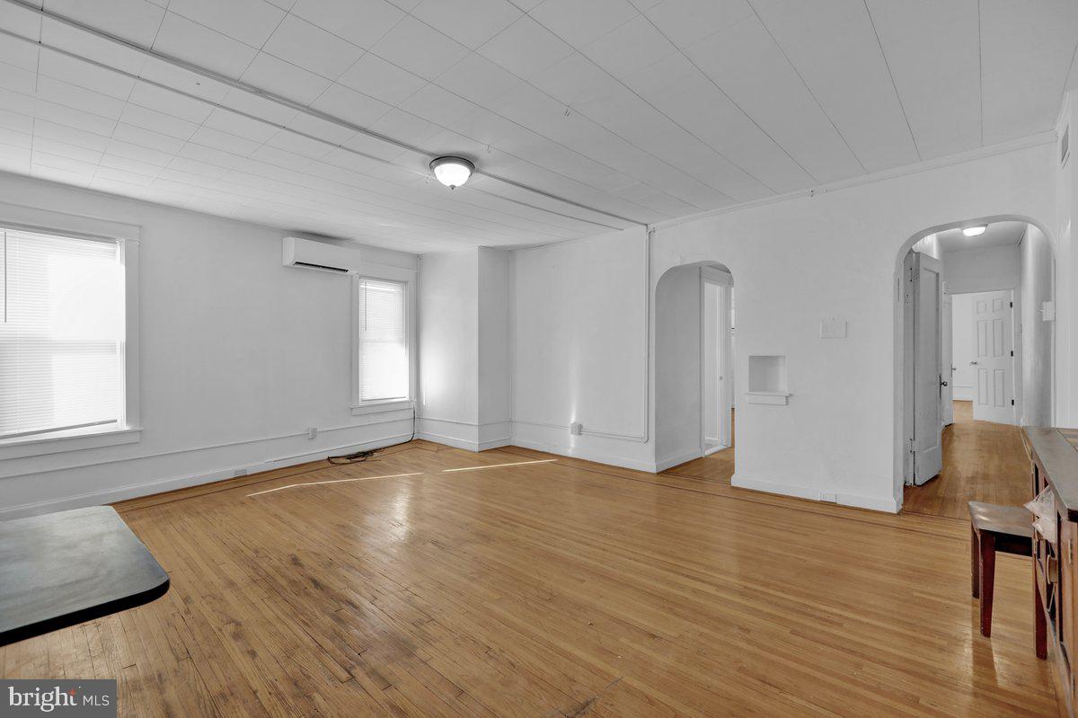 4000 Penn Sinking Spring Sinking Spring, PA 19608 - Photo 7 of 20 an empty room with wooden floor and windows