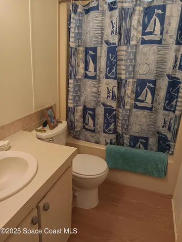 a bedroom with a bed and furniture