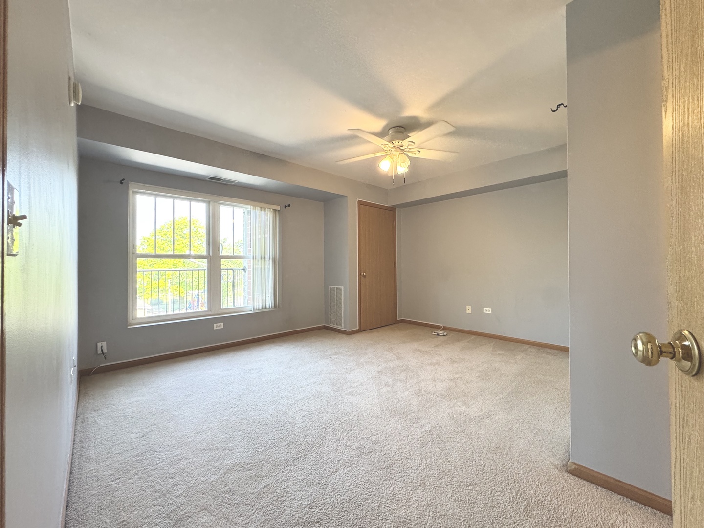 237 North Mill Road, Unit 14 Addison, IL 60101 - Photo 8 of 15 wooden floor in an empty room with a window