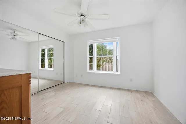 an empty room with windows