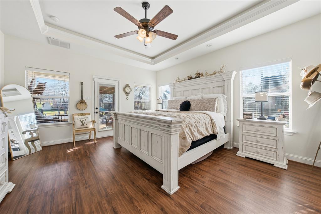 5262 Rio Vista Malakoff, TX 75148 - Photo 14 of 29 a bedroom with a bed wooden floor and window