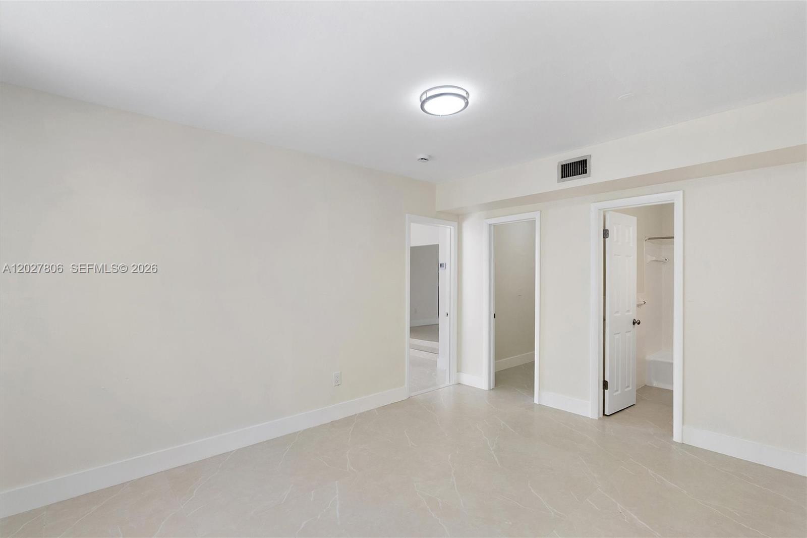 1612 Southwest 23rd Street, Unit 1612 Miami, FL 33145 - Photo 23 of 42 a view of an empty room