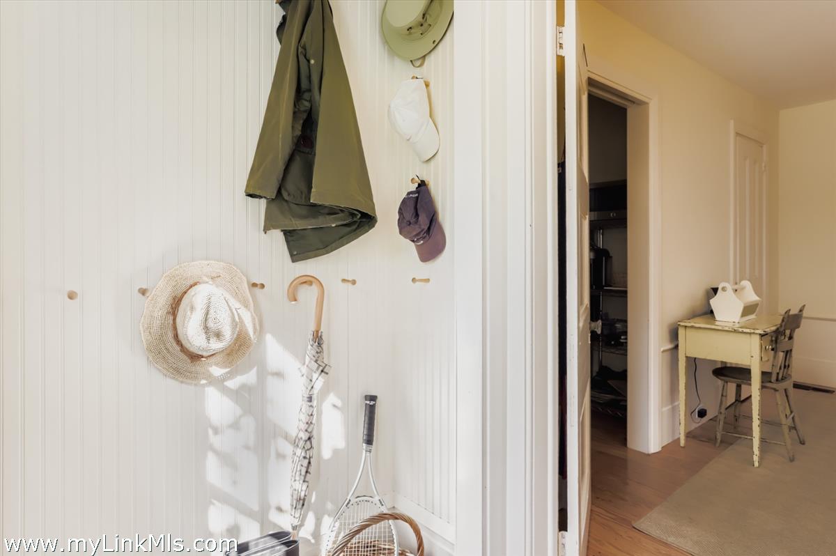 27 Spring Street Vineyard Haven, MA 02568 - Photo 52 of 58 mud room entrance leads from the parking to the kitchen