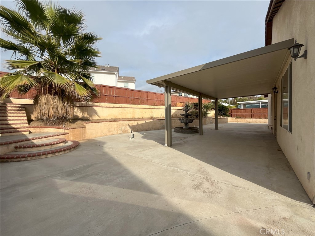 12758 Royal Palm Lane Riverside, CA 92503 - Photo 13 of 16 a view of a swimming pool with a chair
