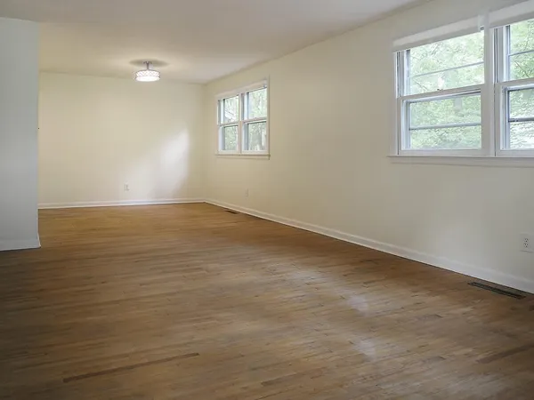 an empty room with windows
