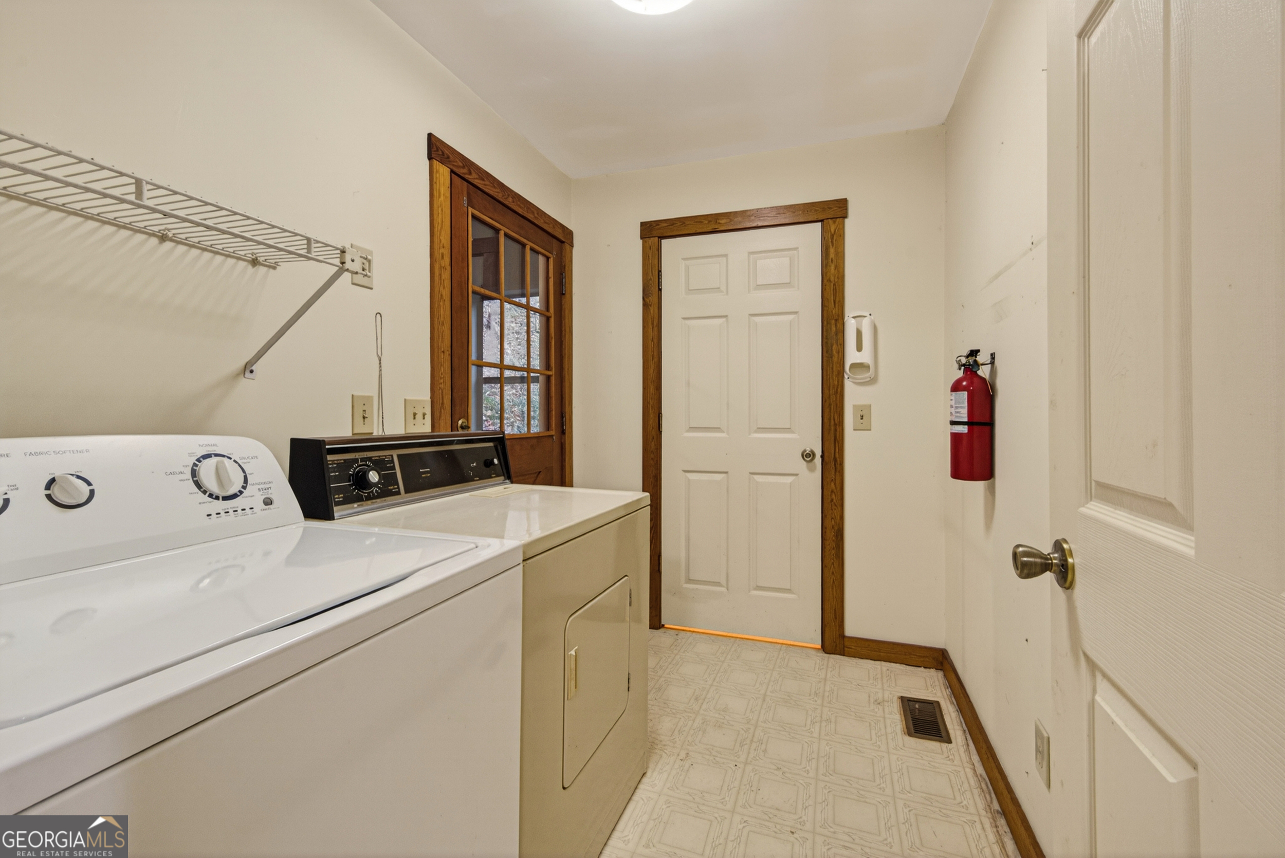 1165 Sparks Branch Road Hiawassee, GA 30546 - Photo 11 of 31 a utility room with dryer and washer