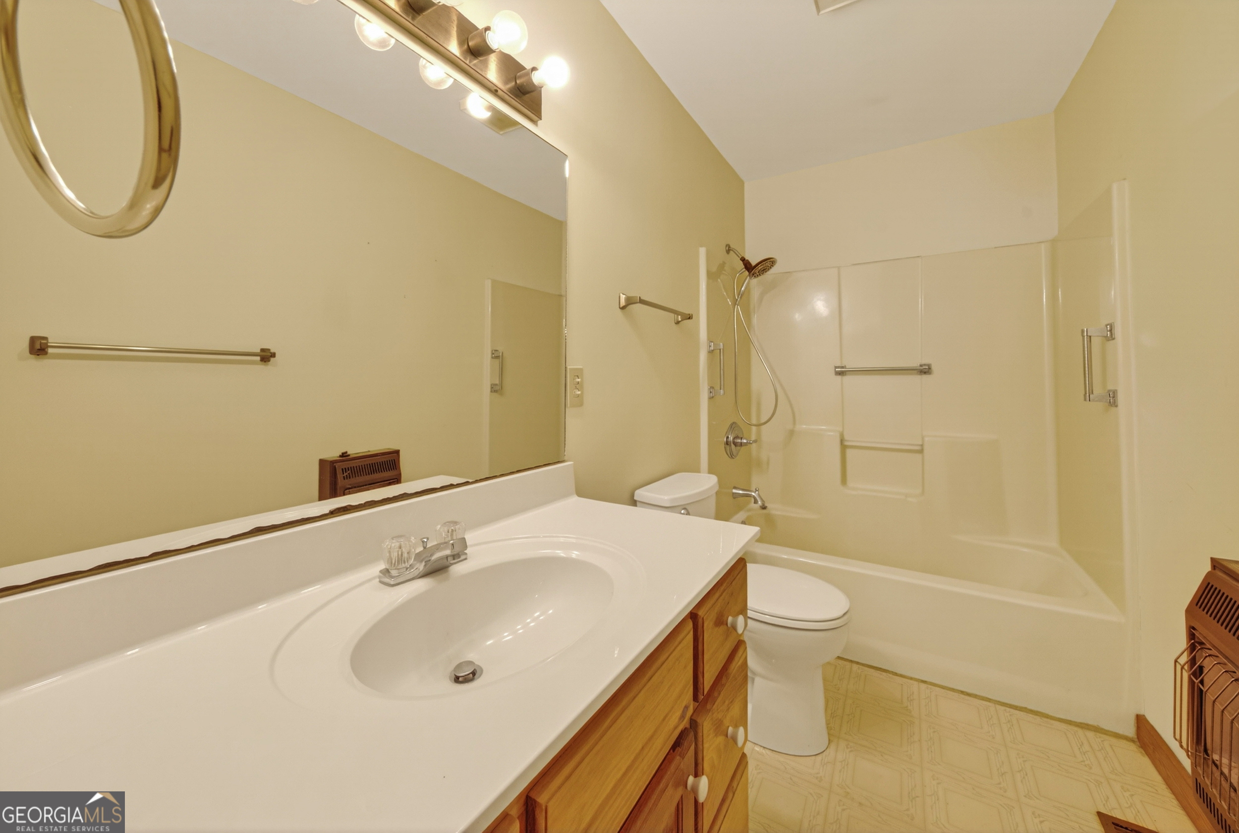 1165 Sparks Branch Road Hiawassee, GA 30546 - Photo 12 of 31 a bathroom with a sink a toilet and shower