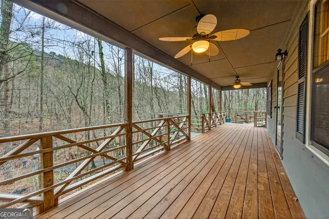 a view of balcony with wooden floor