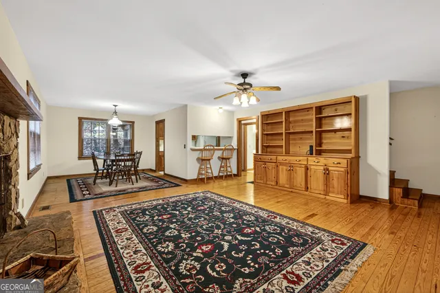 a living room with furniture and a table