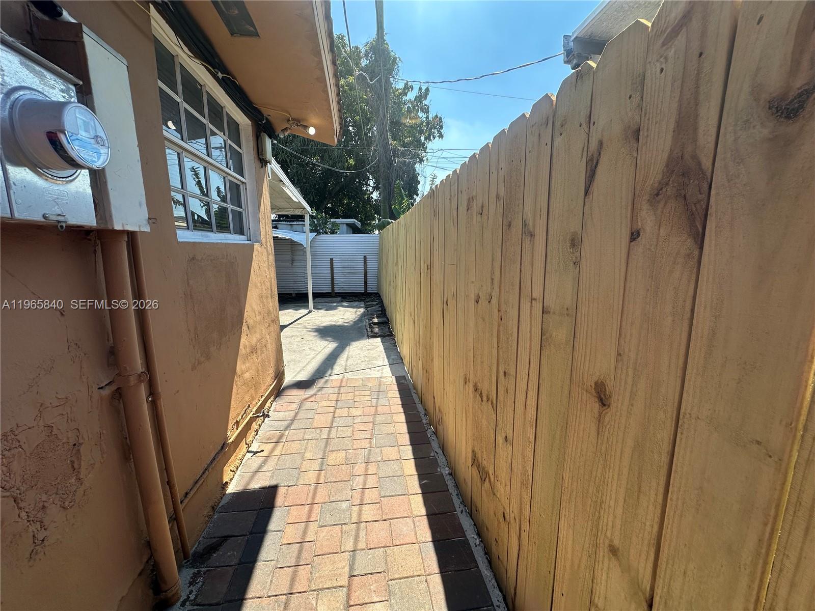 666 West 17th Street, Unit 3 Hialeah, FL 33010 - Photo 10 of 10 a view of balcony with wooden floor and stairs