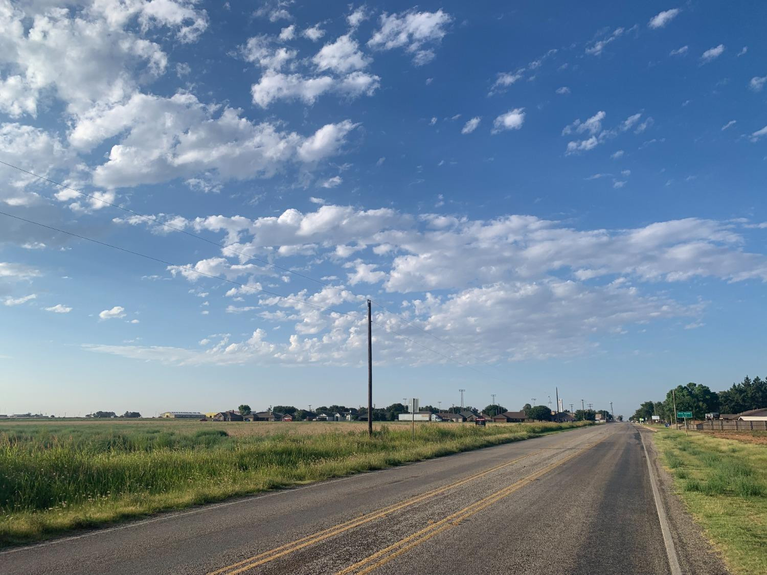a view of a city street and a building