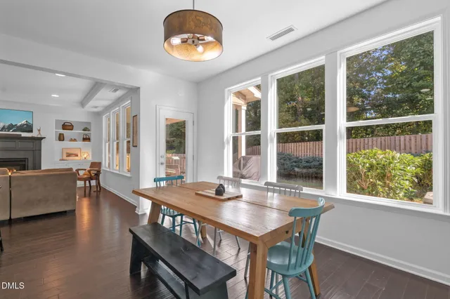 a kitchen with stainless steel appliances granite countertop a kitchen island a stove and a cabinets