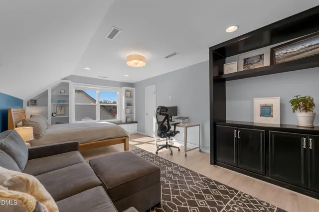 a view of a storage & utility room with a sink