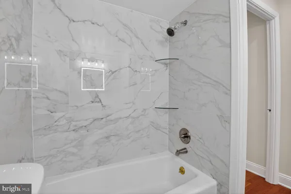 a bathroom with a bathtub