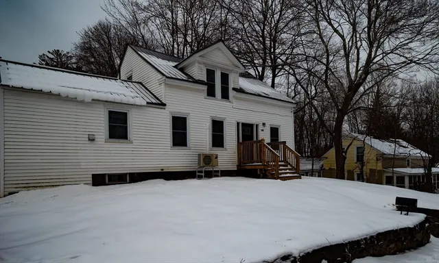 a view of a house with a patio