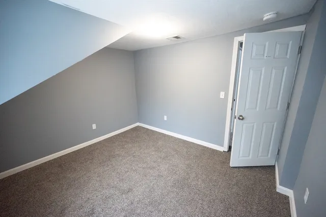 an empty room with a natural light