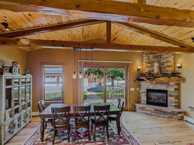 a kitchen with a table and chairs in it