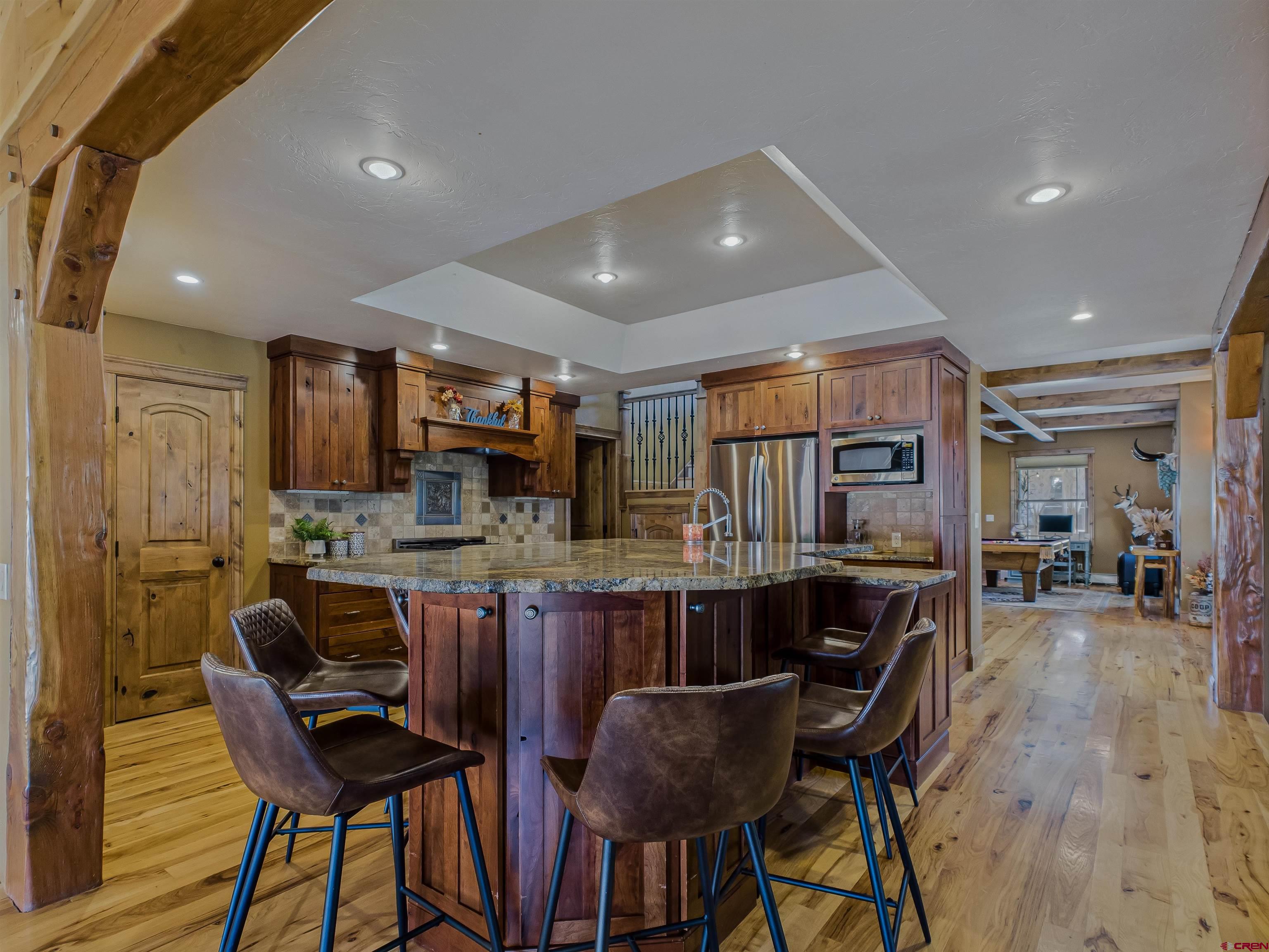 1577 14 1/2 Road Loma, CO 81524 - Photo 25 of 44 a kitchen with a table and chairs in it