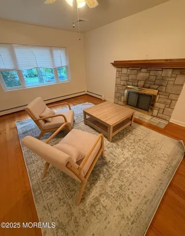 a view of entryway with wooden floor