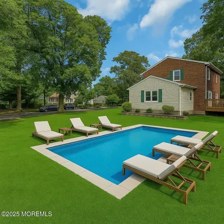 a view of an outdoor sitting area with a backyard