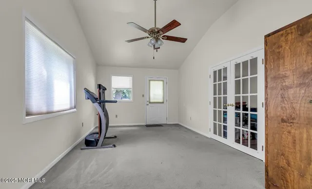 a living room with hard wood floors