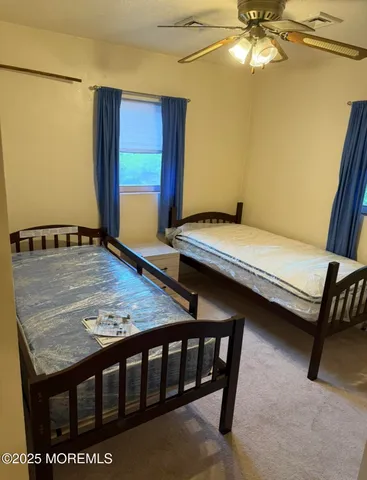 a living room with hard wood floor