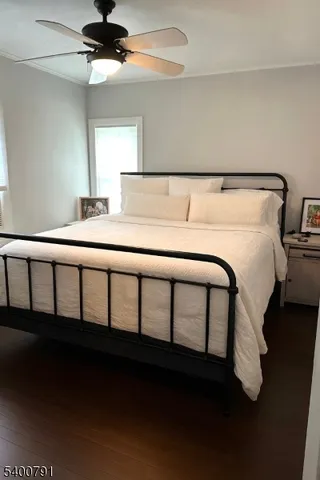 a bedroom with a bed in it